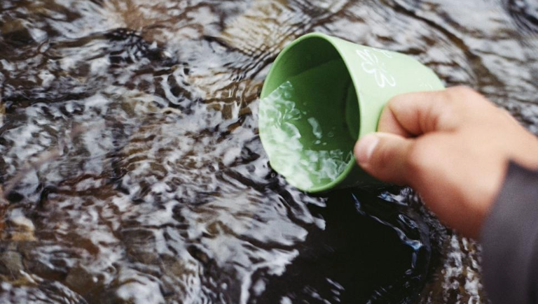 Person holding wet object | Why Your Fingers Wrinkle in Water